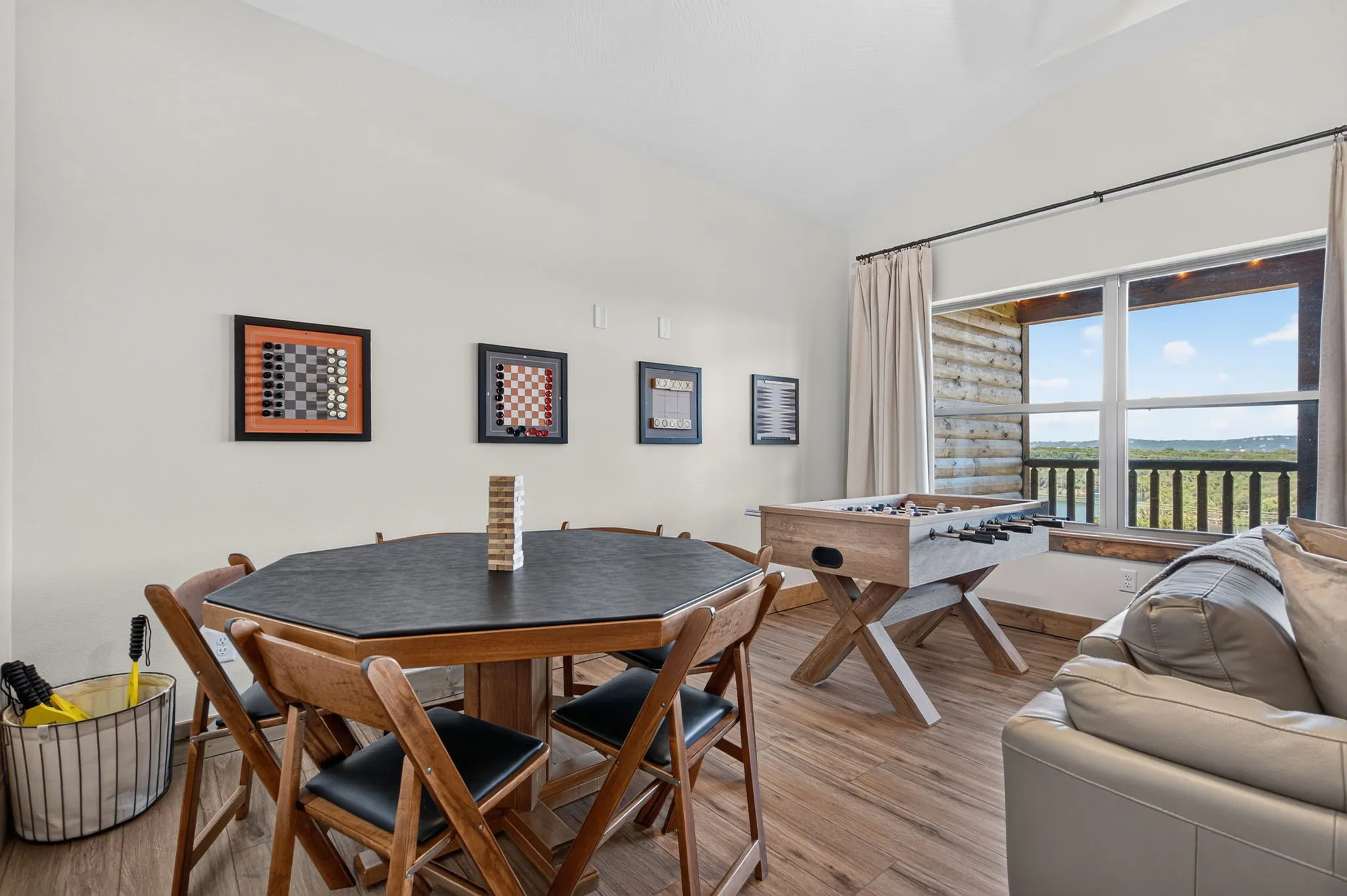 Game room with pool and foosball tables