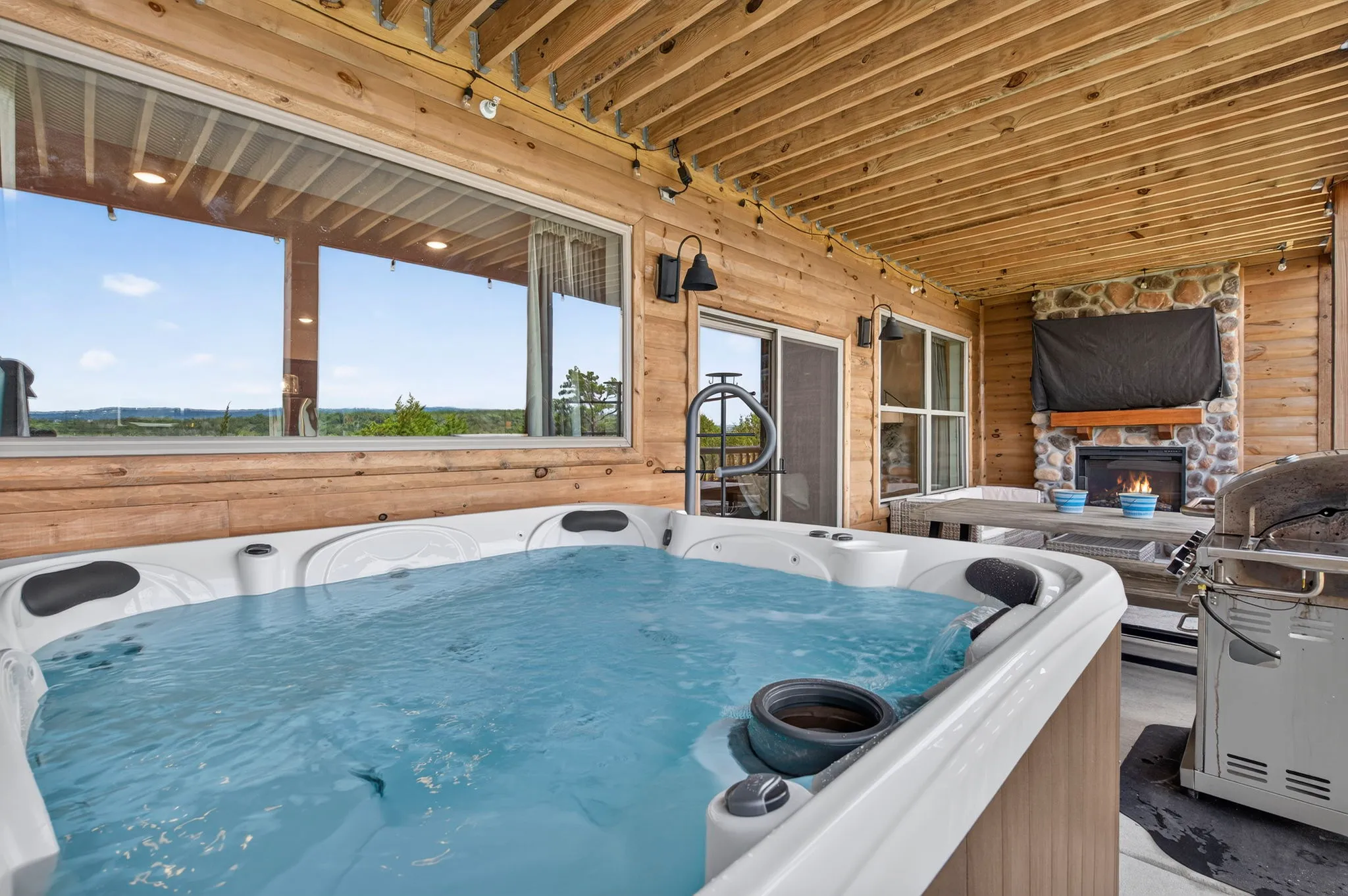 Resort hot tub steps from the home